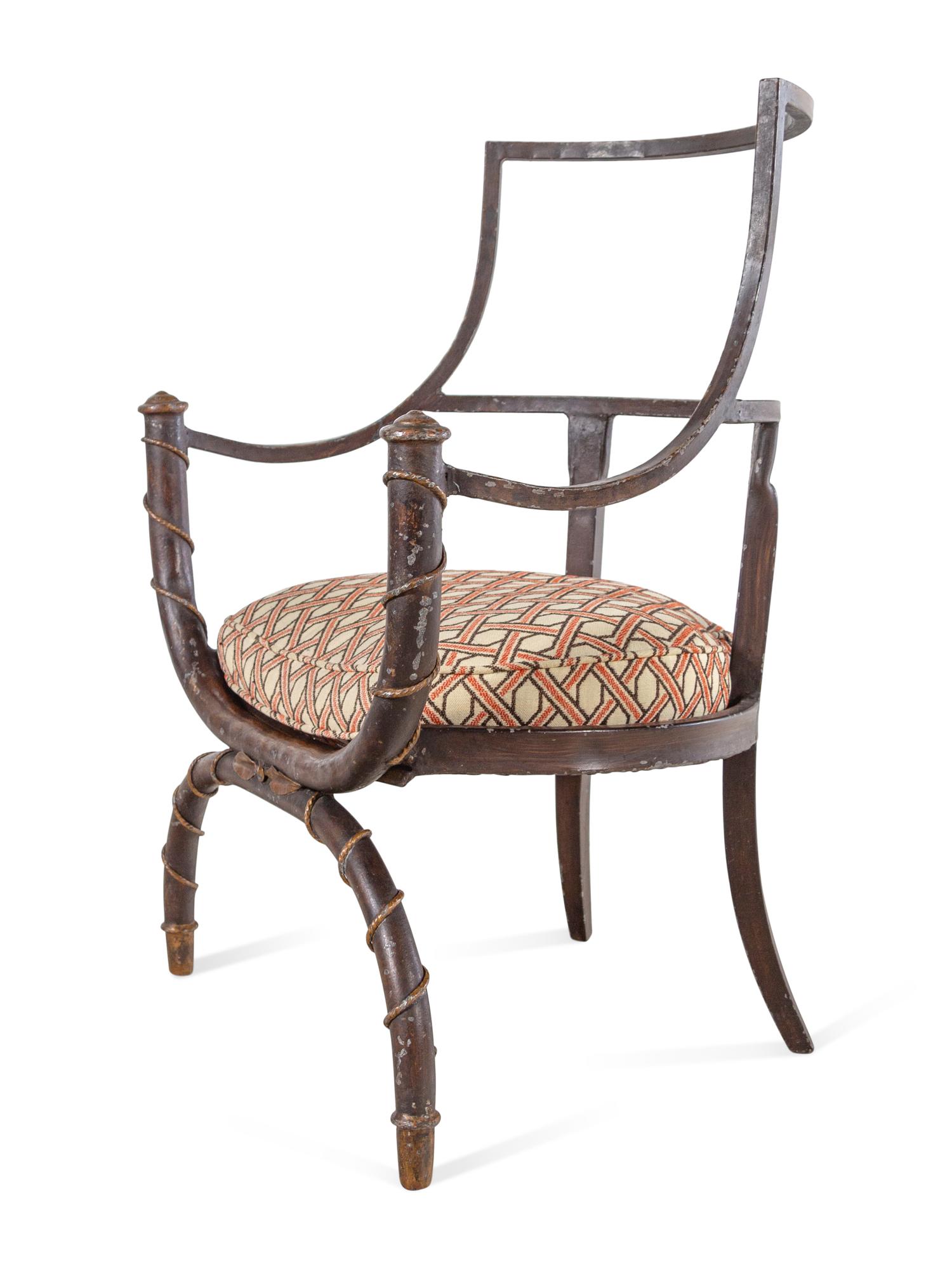 A Set of Three Painted Metal Curule Armchairs