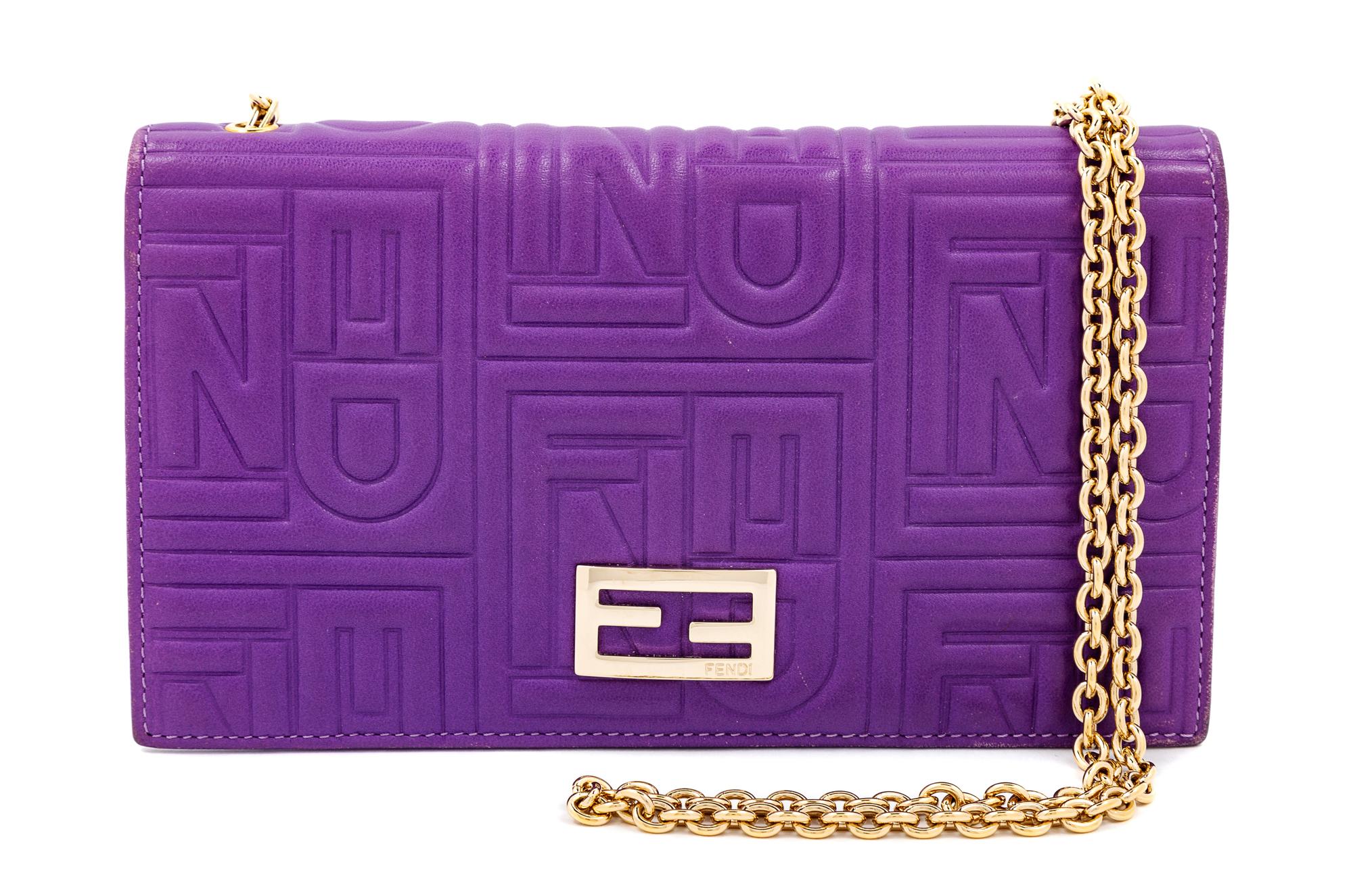 A Fendi Purple Monogram Embossed Leather Wallet/Shoulder Bag, 4" H x 7.5" W x .75" D; Strap drop: 19".