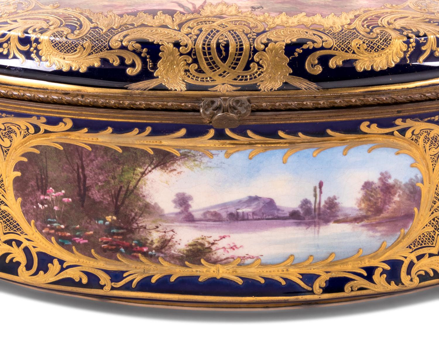 A Sèvres Style Painted and Parcel Gilt Porcelain Table Casket