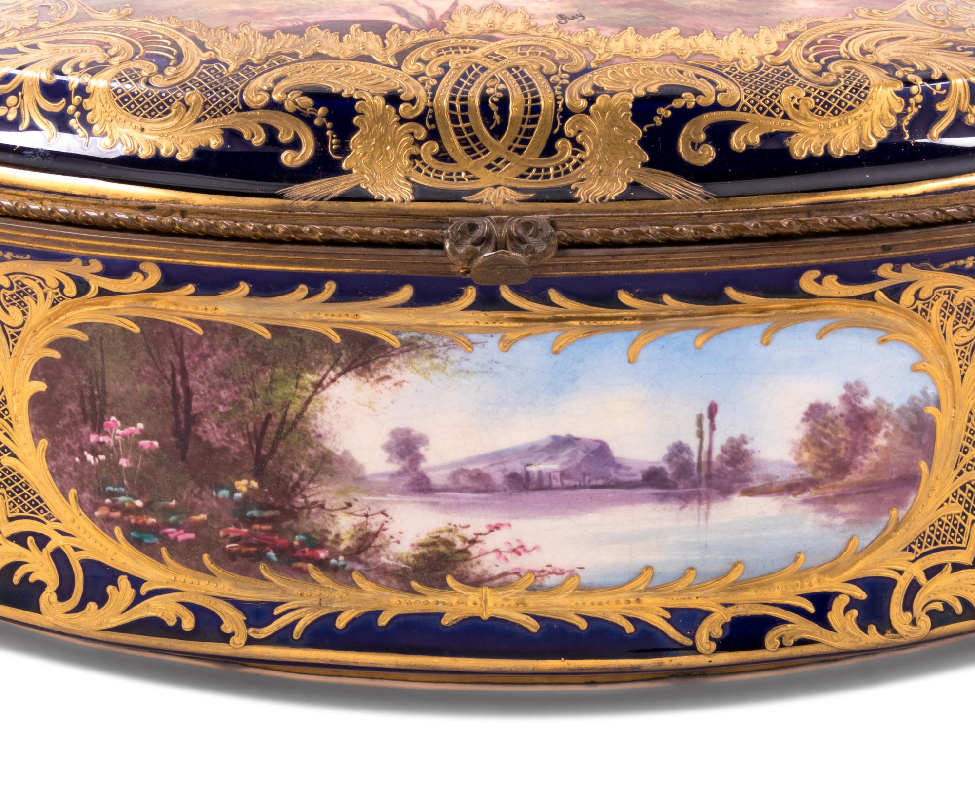 A Sèvres Style Painted and Parcel Gilt Porcelain Table Casket