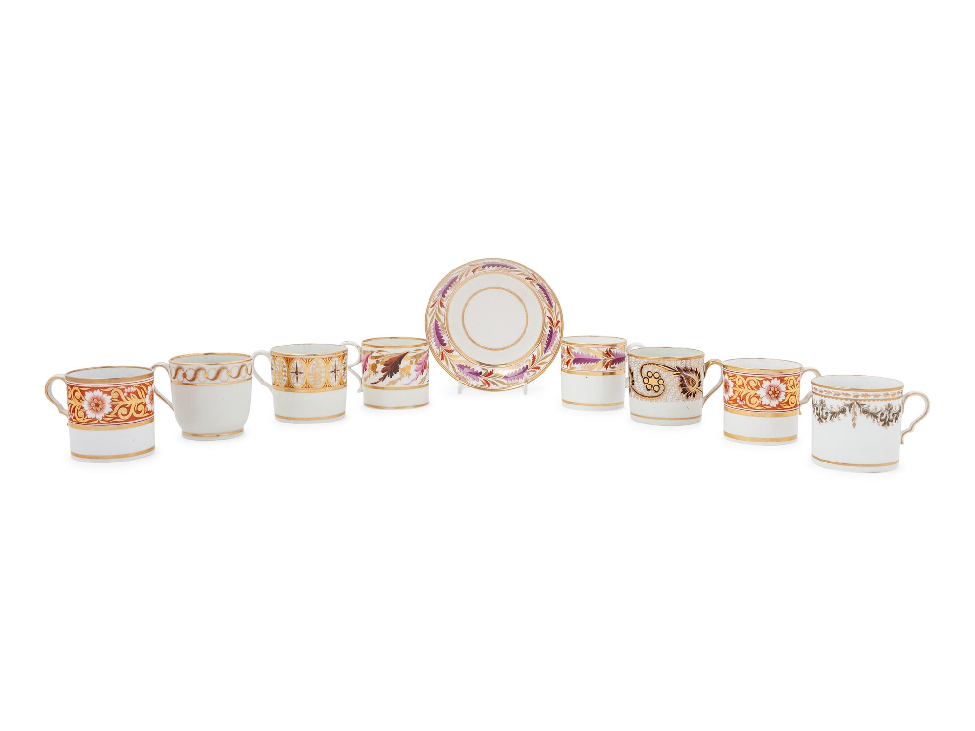 A Group of Eight English Porcelain Coffee Canns