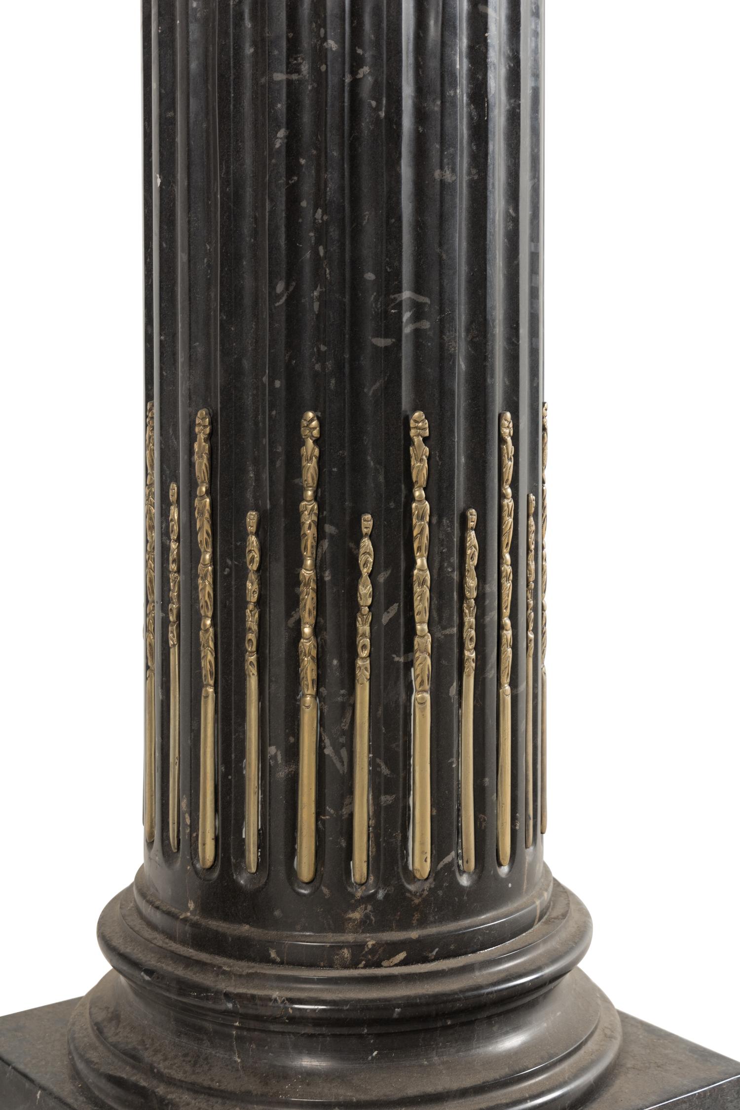 A Pair of Neoclassical Style Gilt Bronze Mounted Black Marble Pedestals