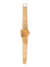 PIAGET, REF. 950 18K YELLOW GOLD AND COIN SURPRISE WRISTWATCH