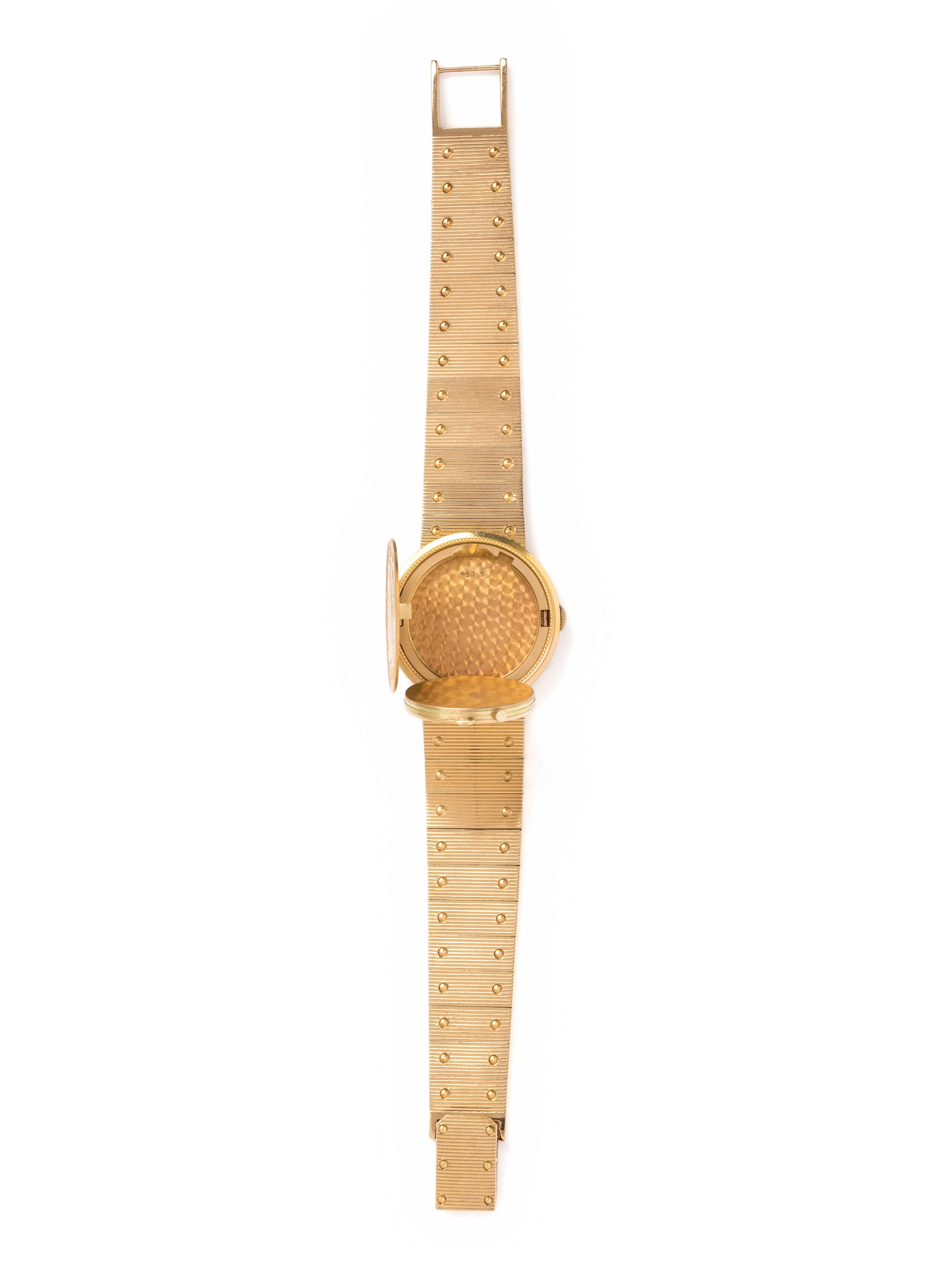 PIAGET, REF. 950 18K YELLOW GOLD AND COIN SURPRISE WRISTWATCH