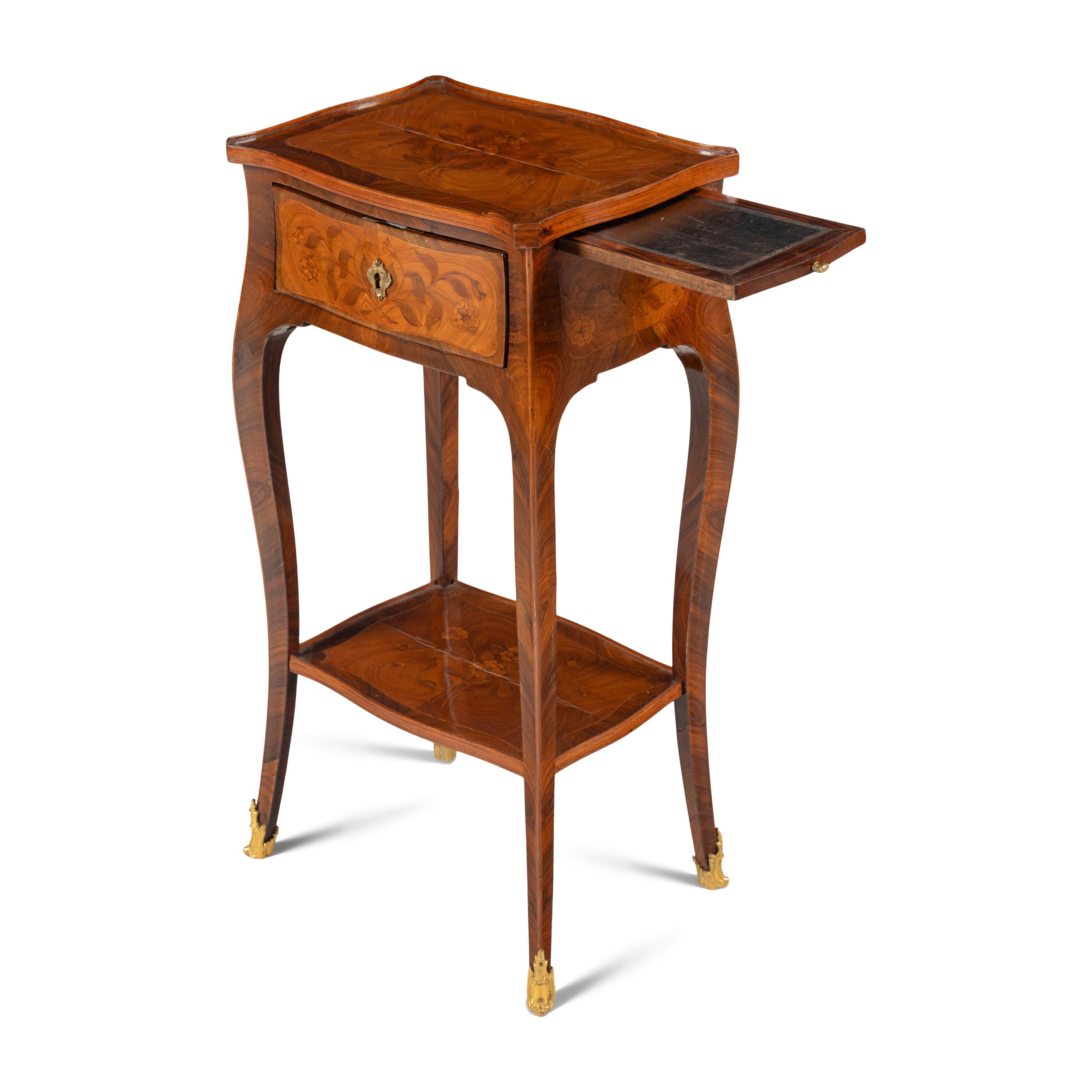 A Louis XV Gilt Bronze Mounted Kingwood, Tulipwood and Floral Marquetry Occasional Table