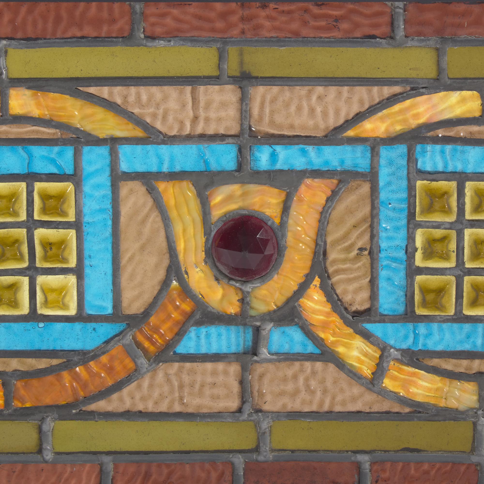 A Group of Four Stained Glass Window Panels