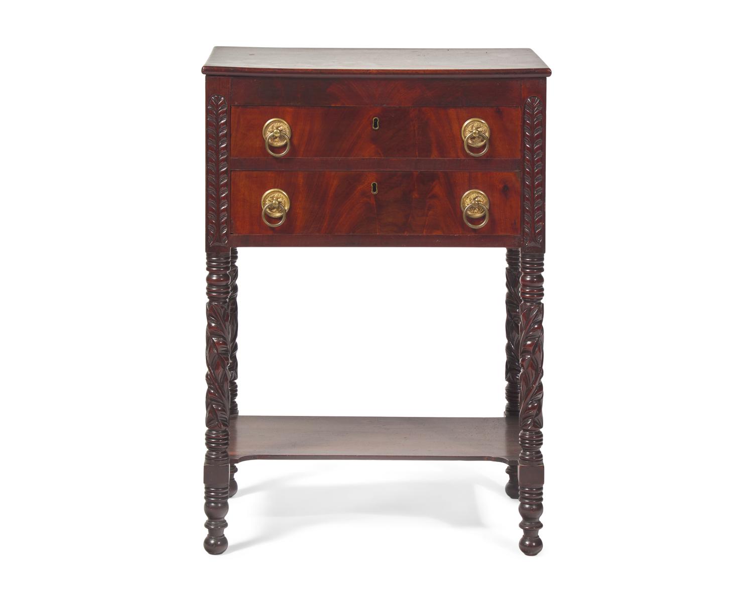 A Classical Carved Mahogany Two-Drawer Stand