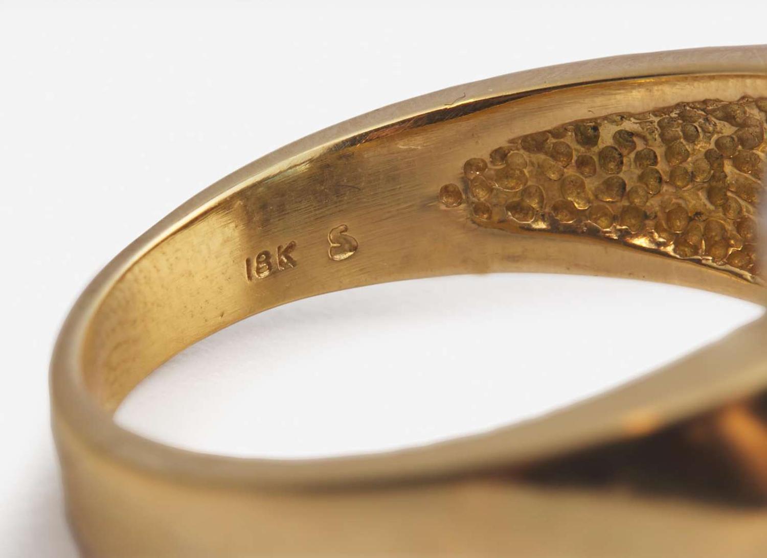 An 18K Gold, Aquamarine, and Diamond Ring