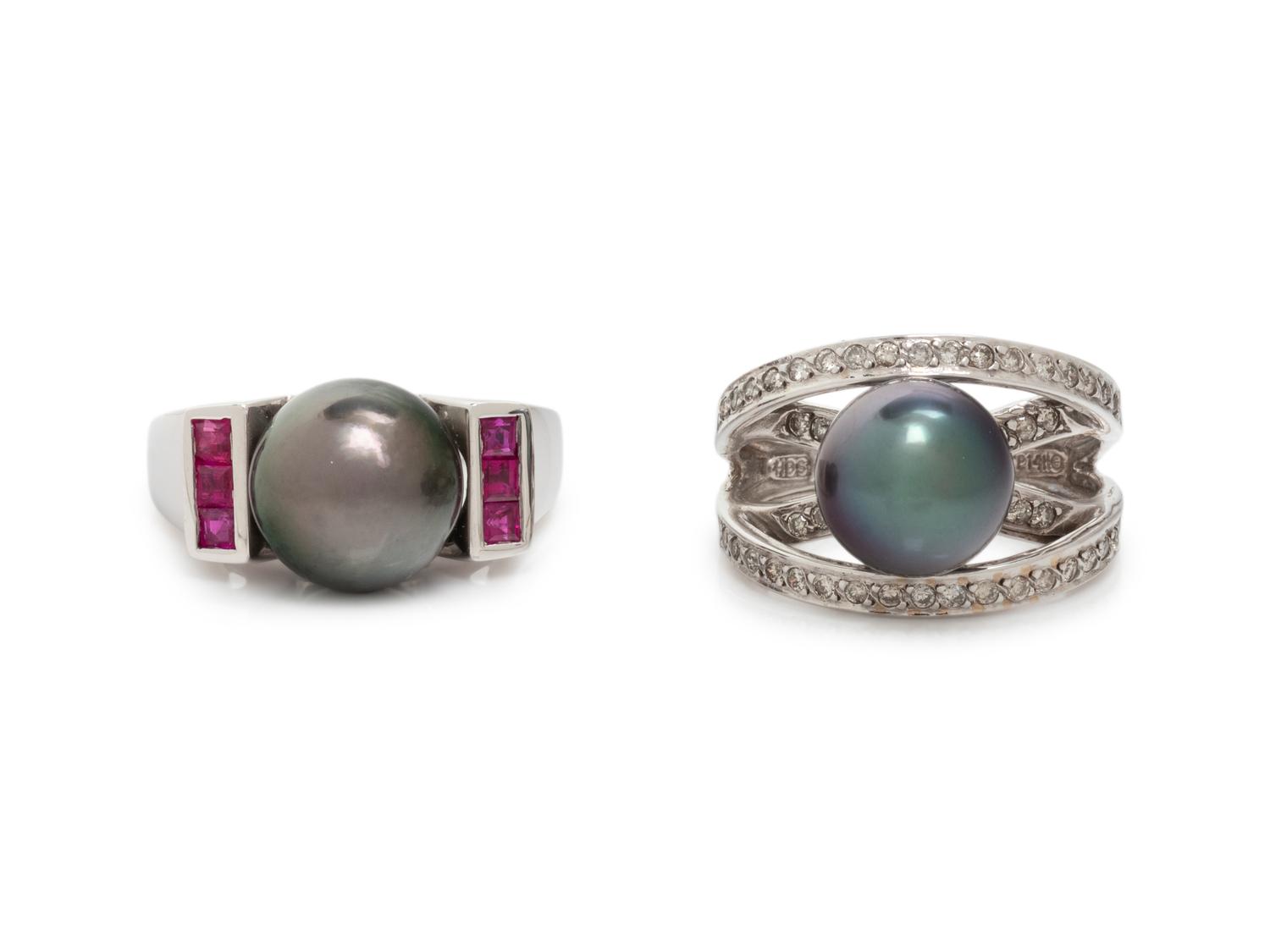A COLLECTION OF WHITE GOLD AND CULTURED PEARL RINGS