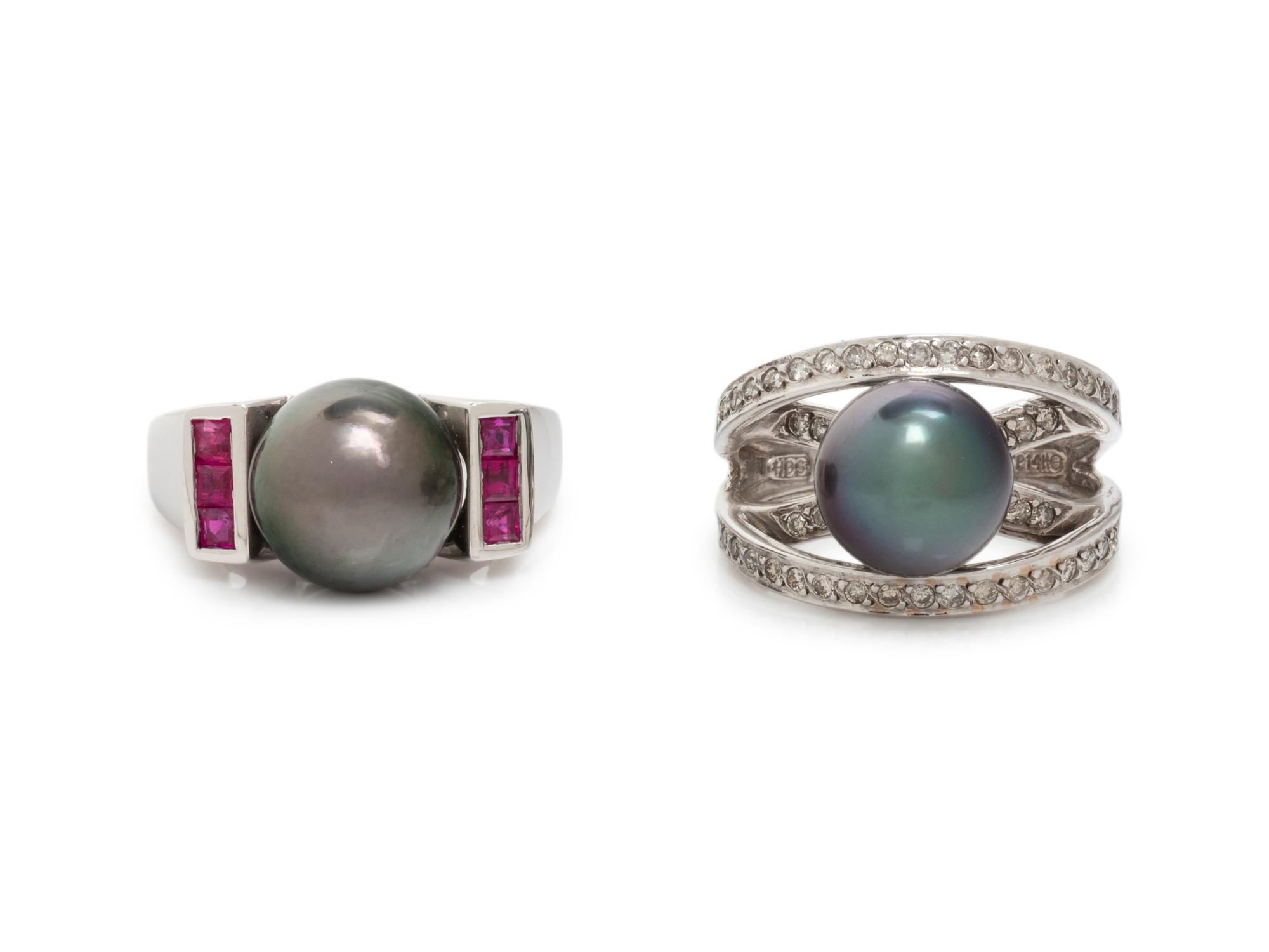A COLLECTION OF WHITE GOLD AND CULTURED PEARL RINGS