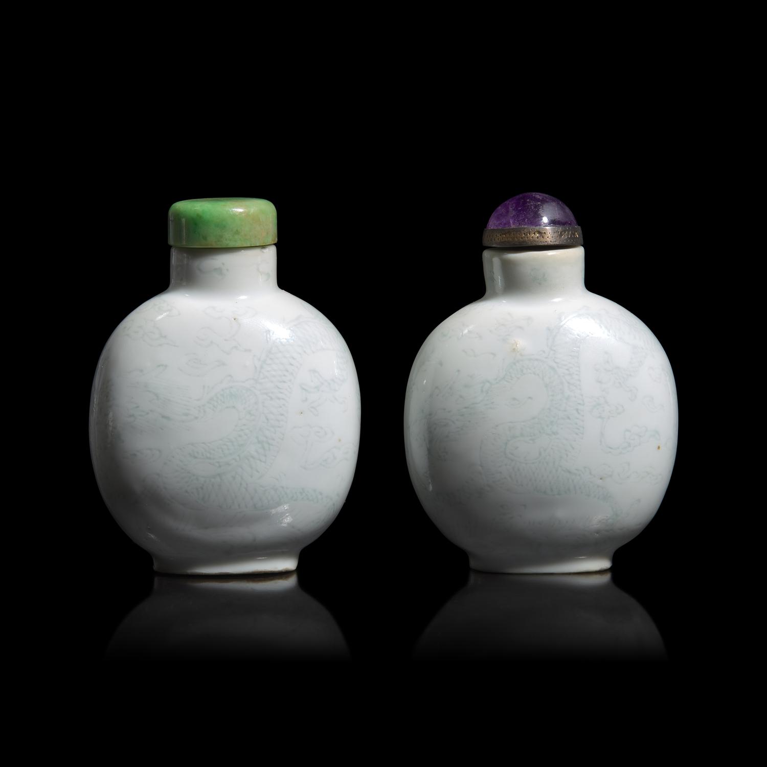 An Unusual Associated Pair of Incised Porcelain "Dragon" Snuff Bottles, Circa 1800-1850
