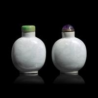 An Unusual Associated Pair of Incised Porcelain "Dragon" Snuff Bottles, Circa 1800-1850