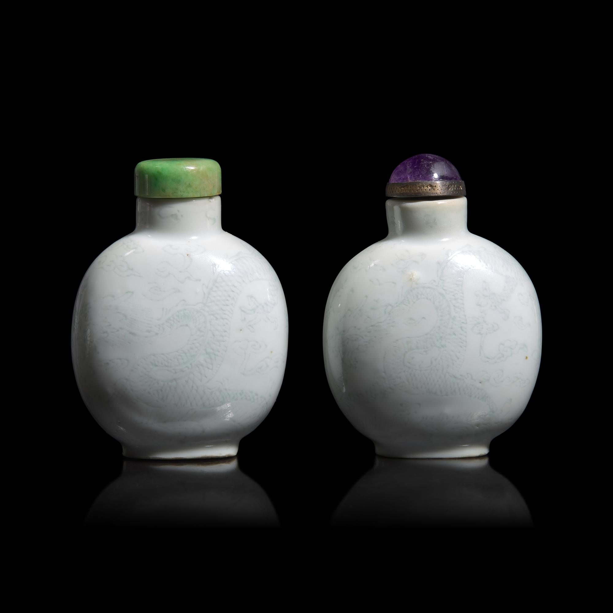 An Unusual Associated Pair of Incised Porcelain "Dragon" Snuff Bottles, Circa 1800-1850