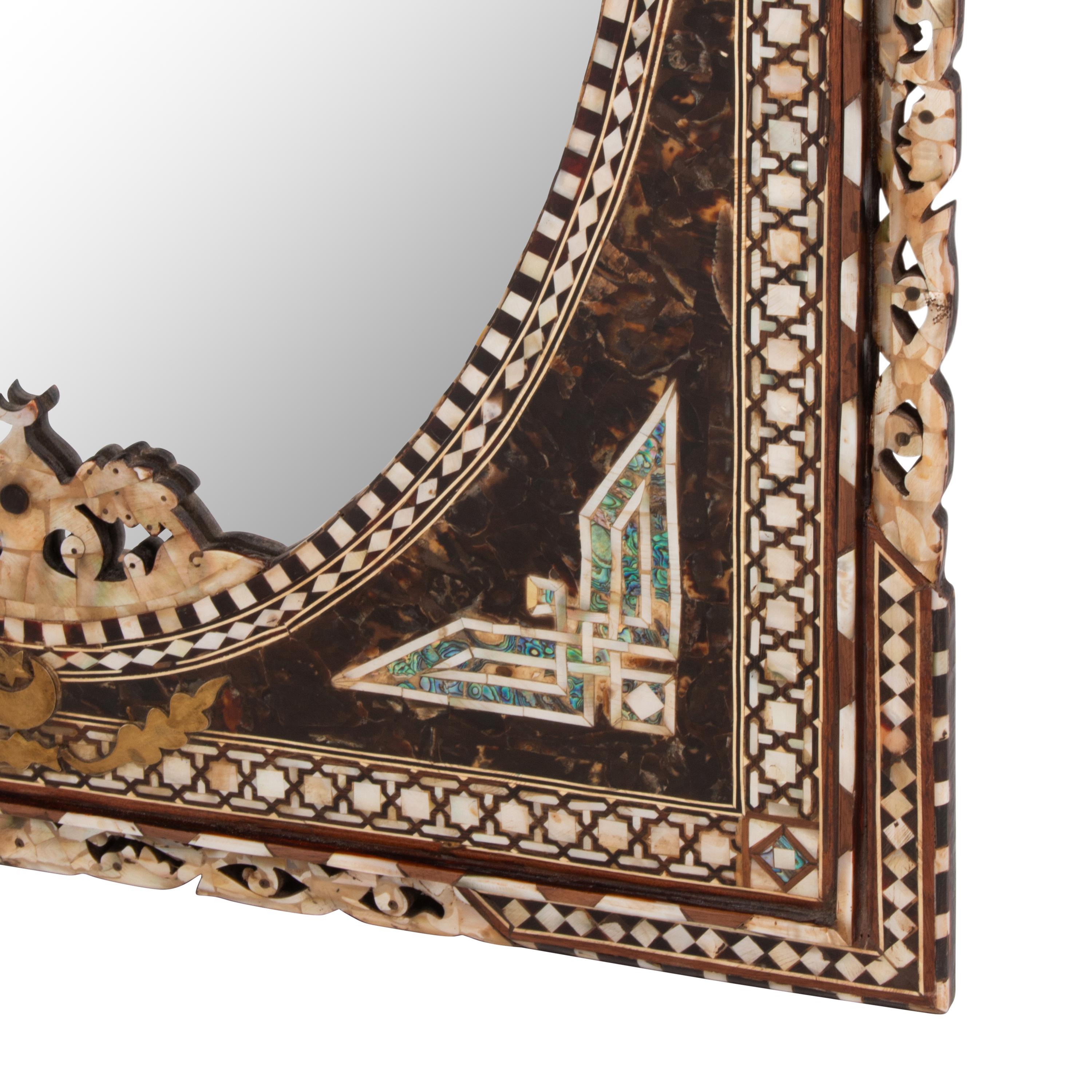 A Pair of Iberian Marquetry Oval Mirrors