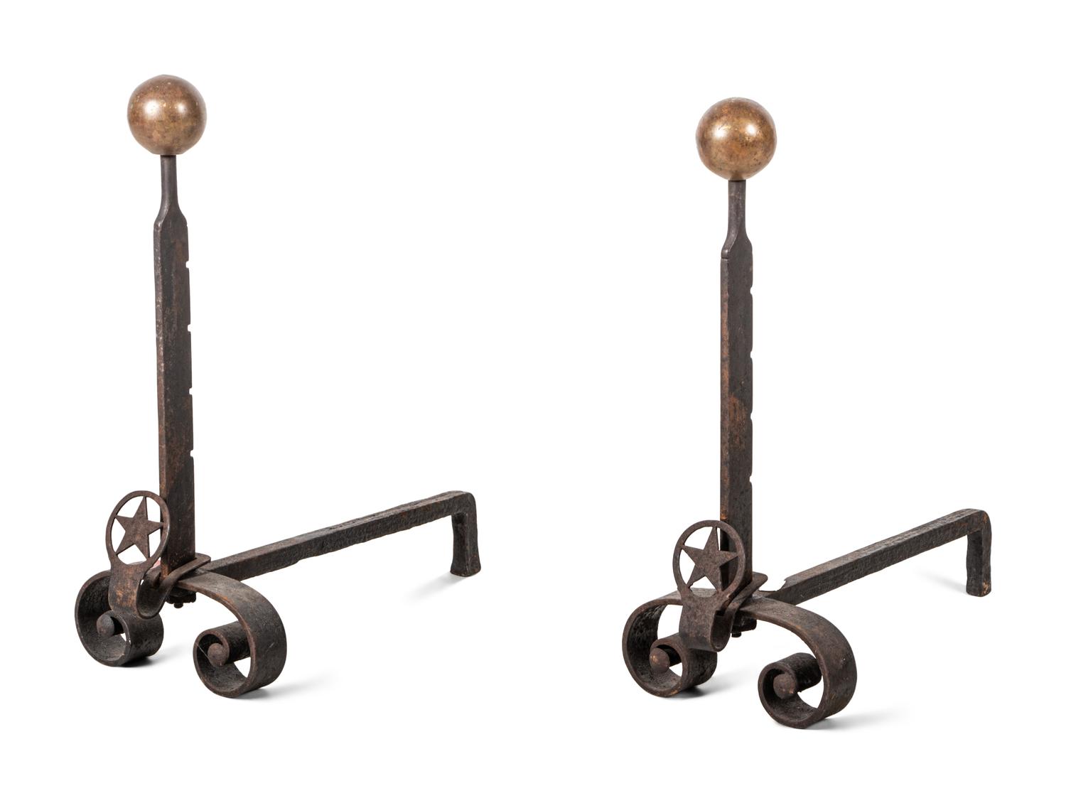 A Pair of Iron Andirons with Star Ornaments