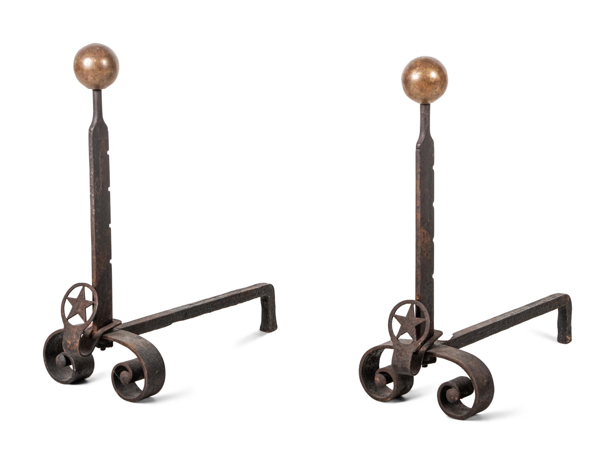 A Pair of Iron Andirons with Star Ornaments