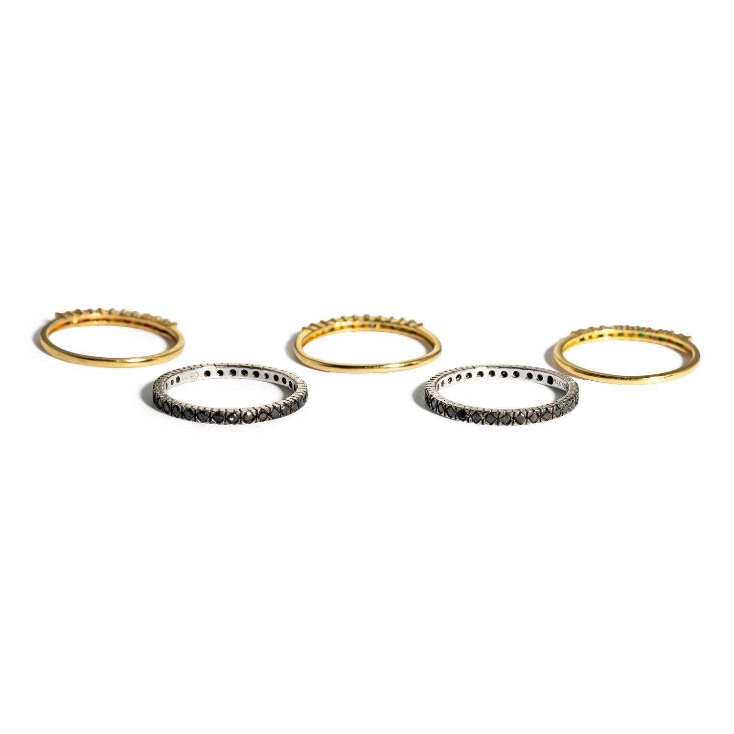 COLLECTION OF FIVE STACKING YELLOW GOLD AND MULITGEM BANDS