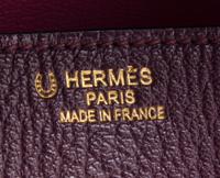 An Hermes Bicolor Raisin Togo 35cm Birkin Handbag, 14" x 10" x 7".