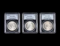 Three Morgan $1 Coins (PCGS MS63)