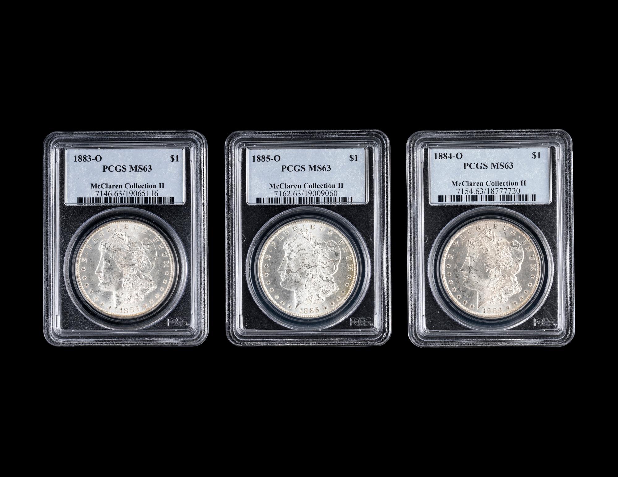 Three Morgan $1 Coins (PCGS MS63)