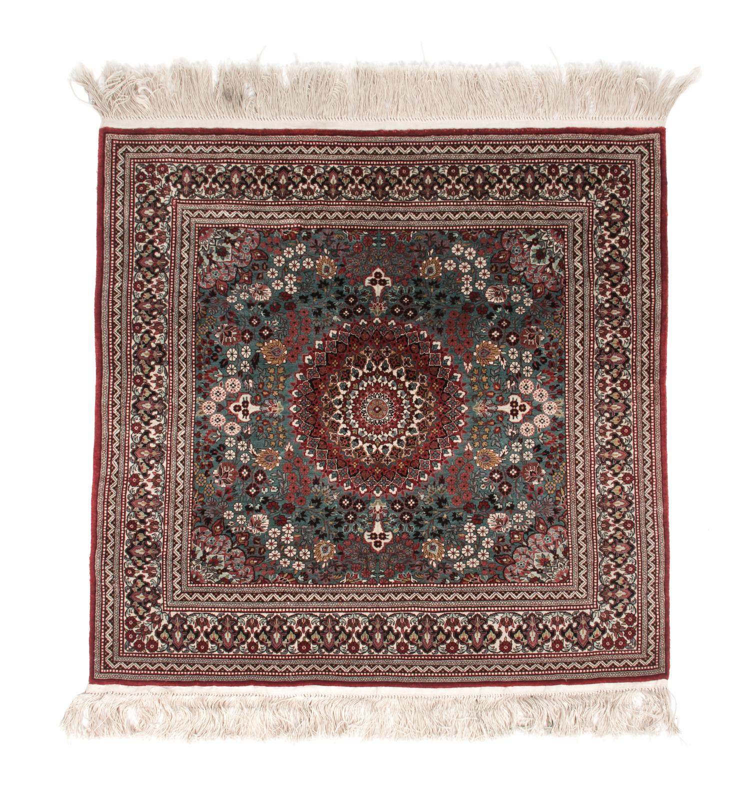 An Iranian Silk Rug 2 feet 8 inches x 2 feet 7 inches.