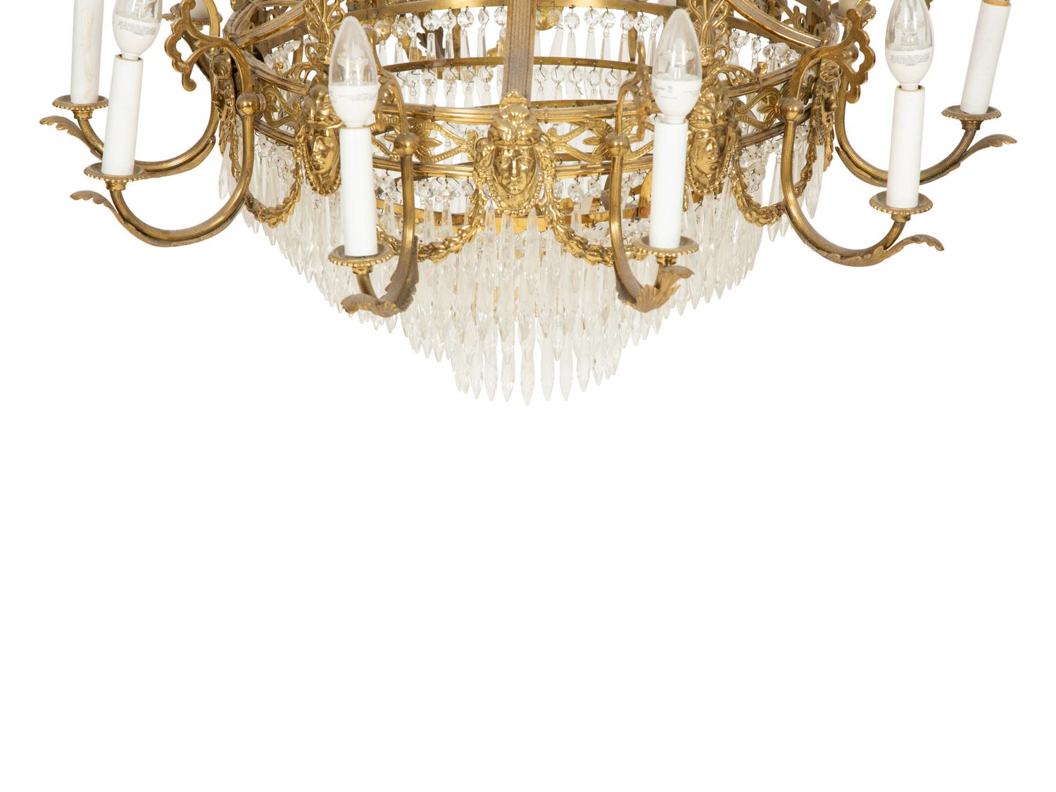 An Empire Style Gilt Metal and Cut Glass Ten-Light Chandelier