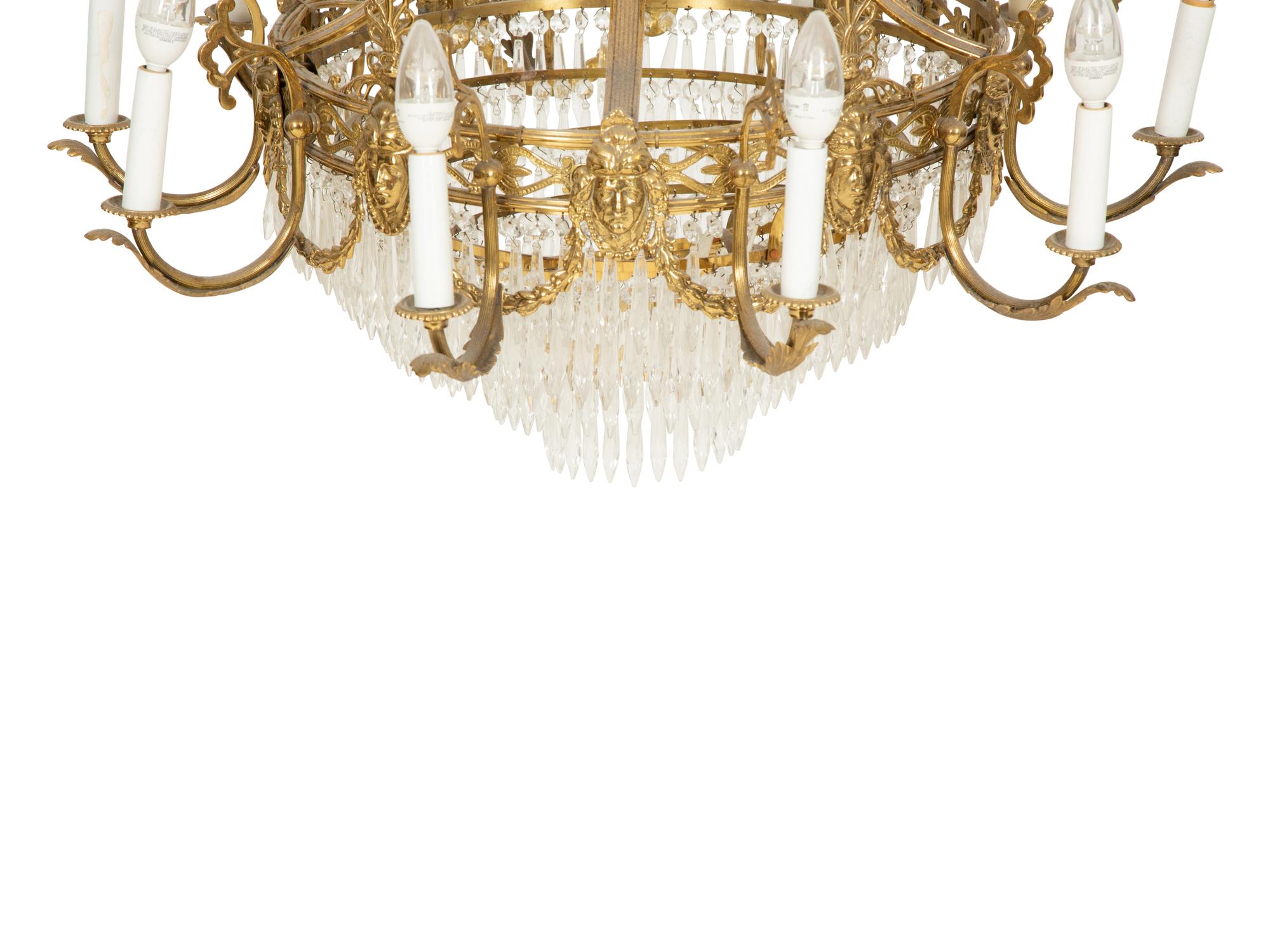 An Empire Style Gilt Metal and Cut Glass Ten-Light Chandelier