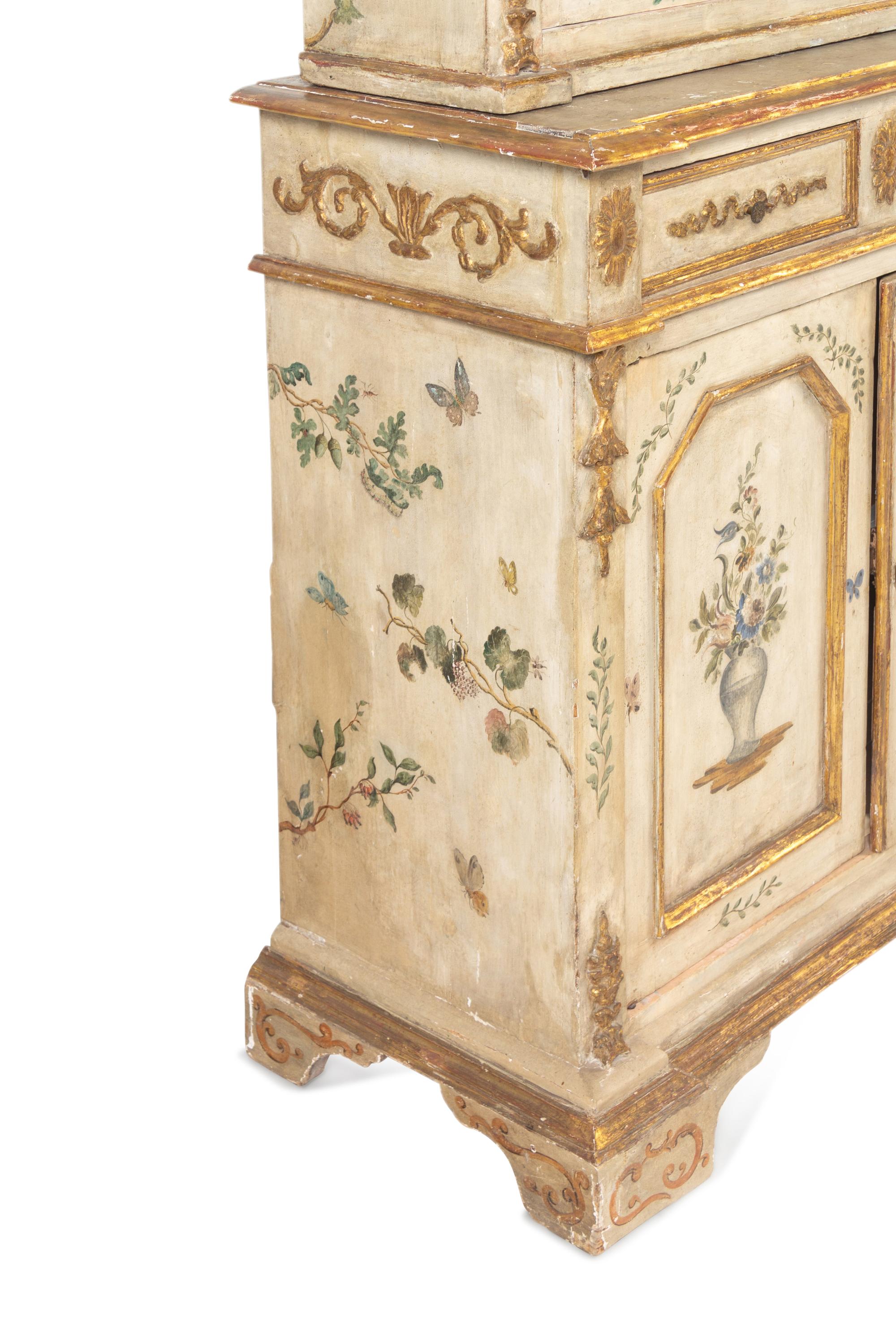 An Italian Polychrome and Cream-Painted and Parcel-Gilt Cabinet