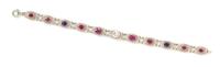 An Edwardian Platinum Topped Gold, Diamond, Ruby and Sapphire Bracelet, Krementz & Co., 5.35 dwts.