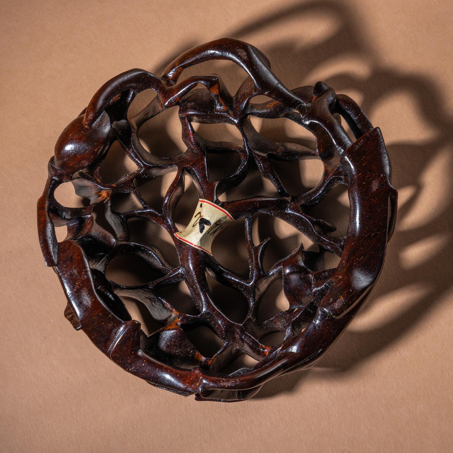 A Rare Yixing Peach-Form 'Figure' Puzzle Cup with Impressed Seals 'Chen', 'Mingyuan' and Wood Stand 陳鳴遠款醉翁桃形公道杯