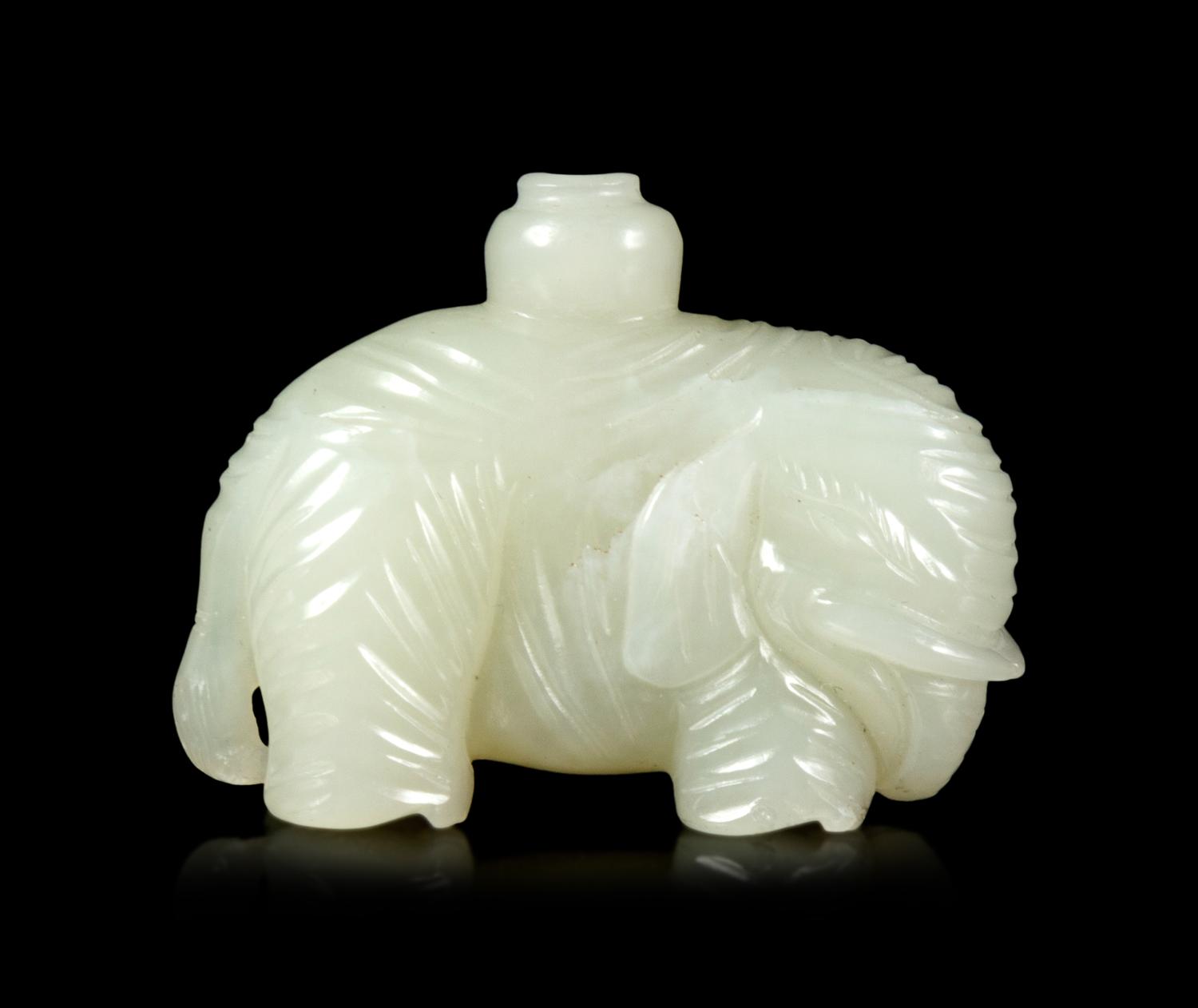 A Small Pale Celadon Jade Figure of an Elephant