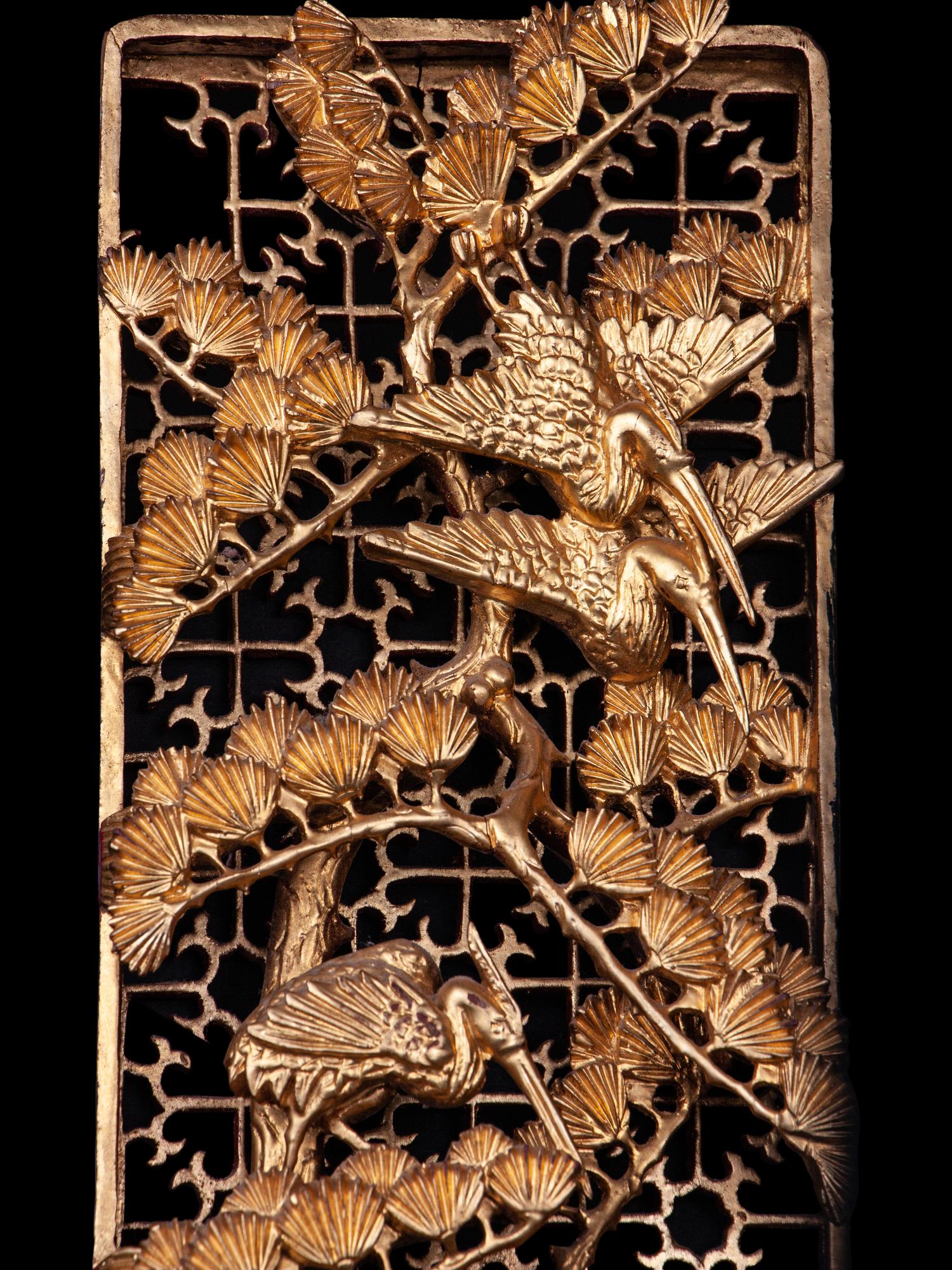 Two Chinese Gilt and Red Lacquered Wood Panels