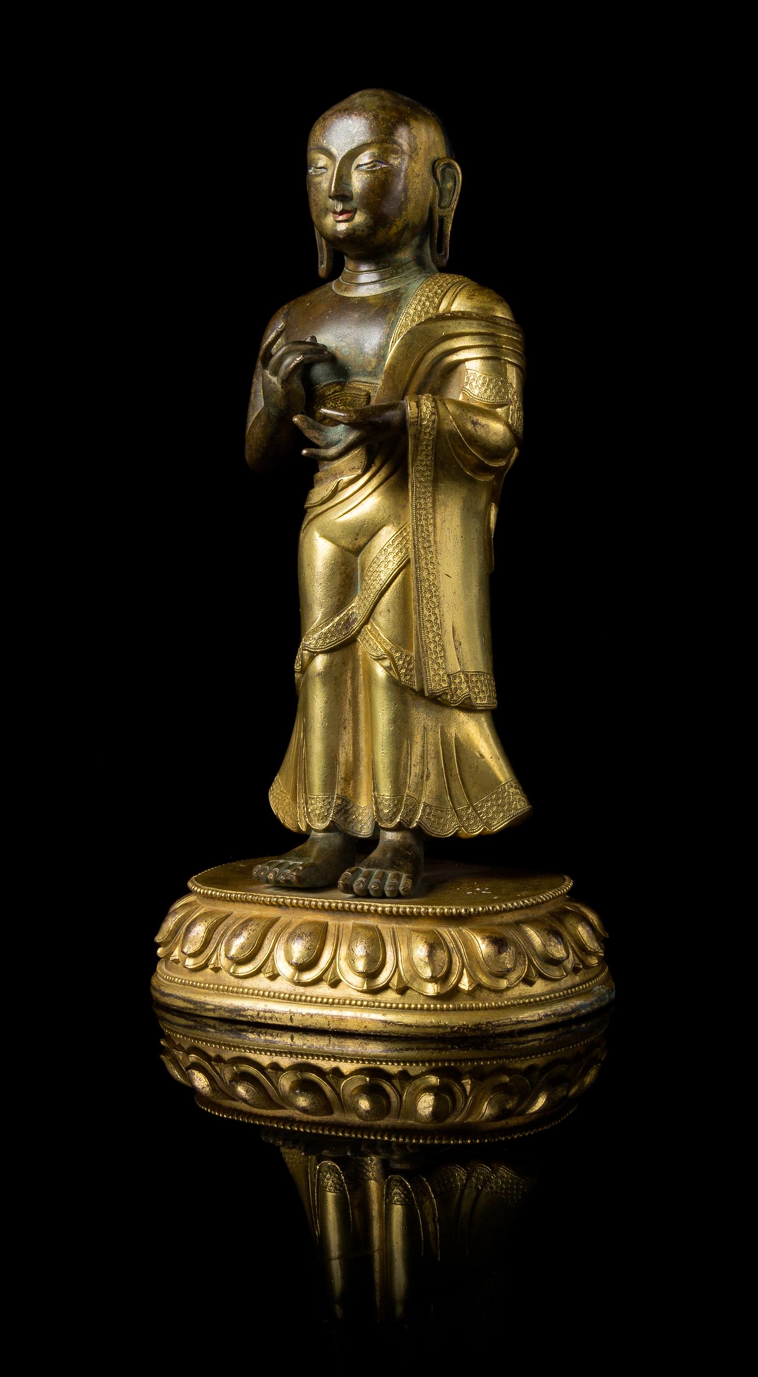 A Sino-Tibetan Gilt Bronze Figure of a Standing Buddhist Monk — 18TH-19TH CENTURY