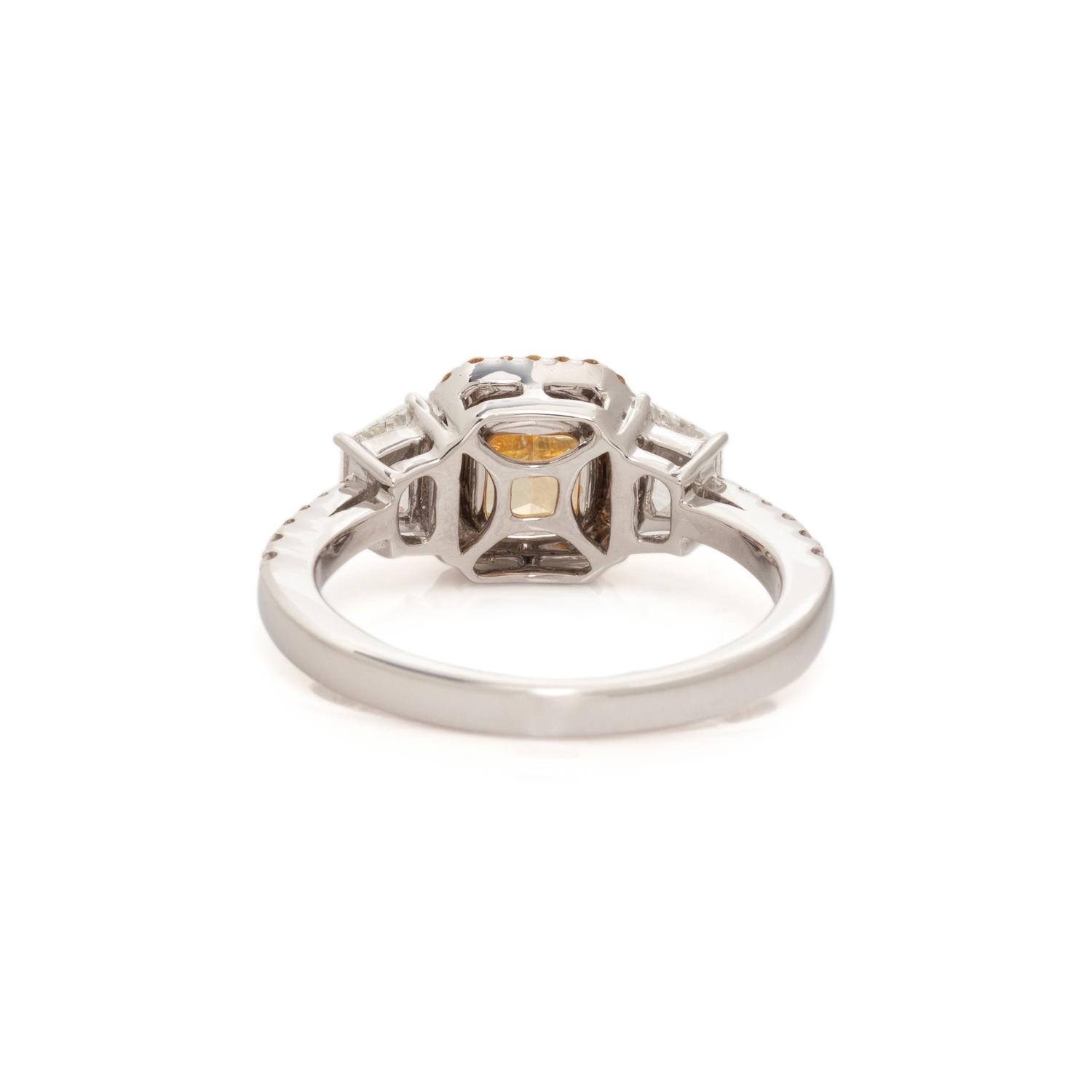 FANCY INTENSE YELLOW DIAMOND AND DIAMOND RING