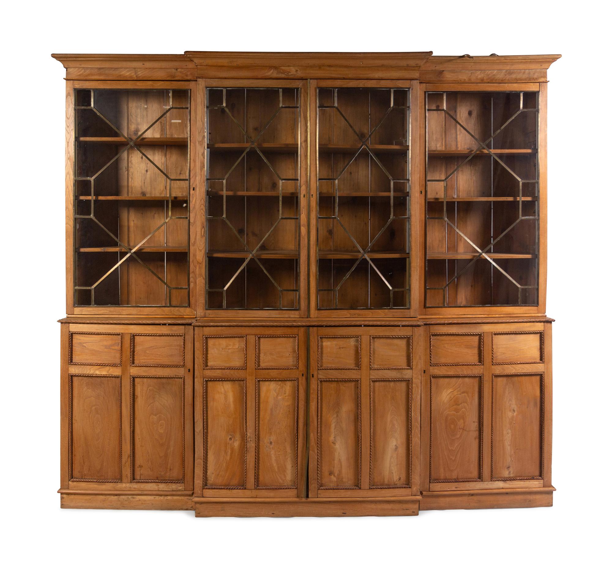 An English Pine Breakfront Bookcase