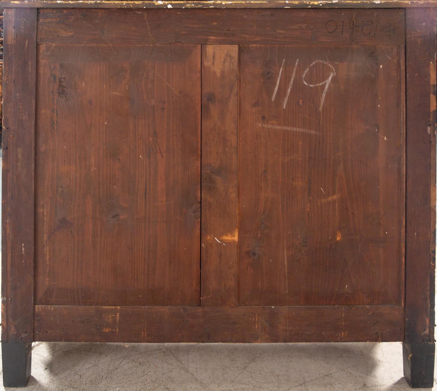 A Regency Style Parcel Gilt and Ebonized Penwork Cabinet