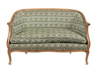 A Louis XV Style Settee with Strawberry Thief Upholstery
