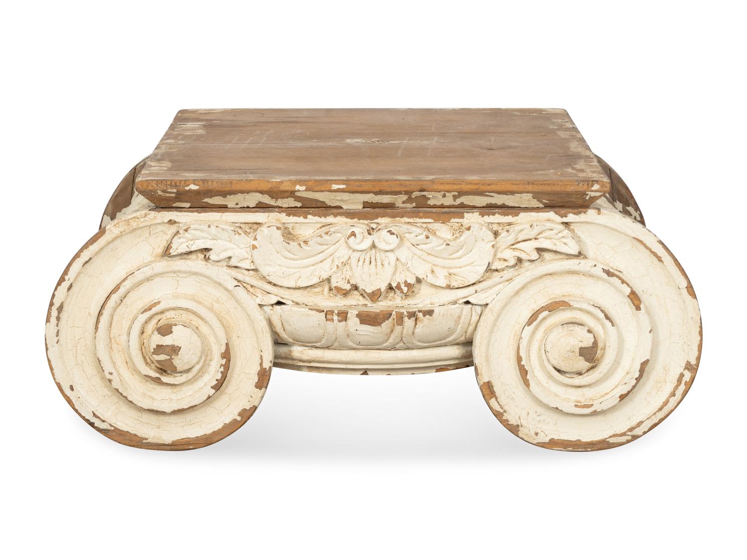 A Carved and Painted Pine Ionic Capital Low Table