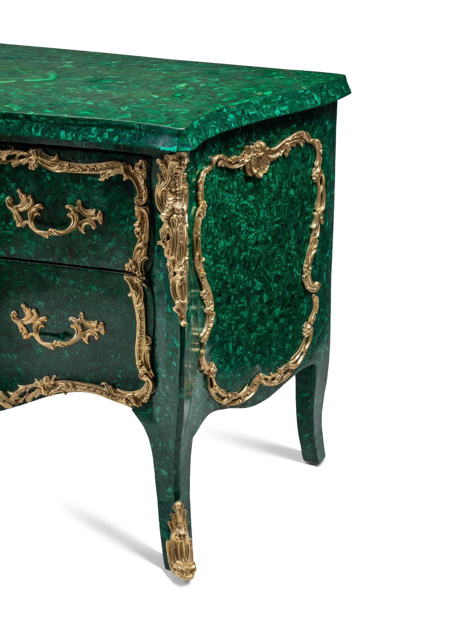A Pair of Louis XV Style Gilt Bronze Mounted Malachite Commodes