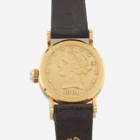 A gold coin wristwatch, Corum