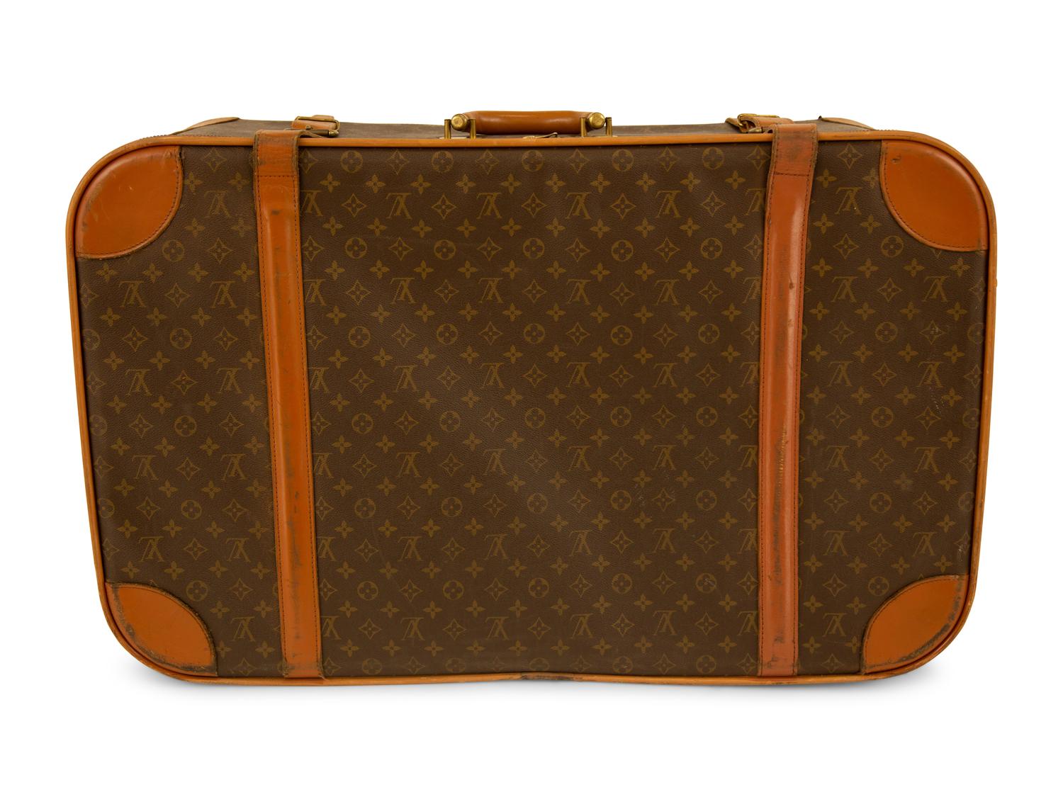 Five Louis Vuitton Luggage Pieces