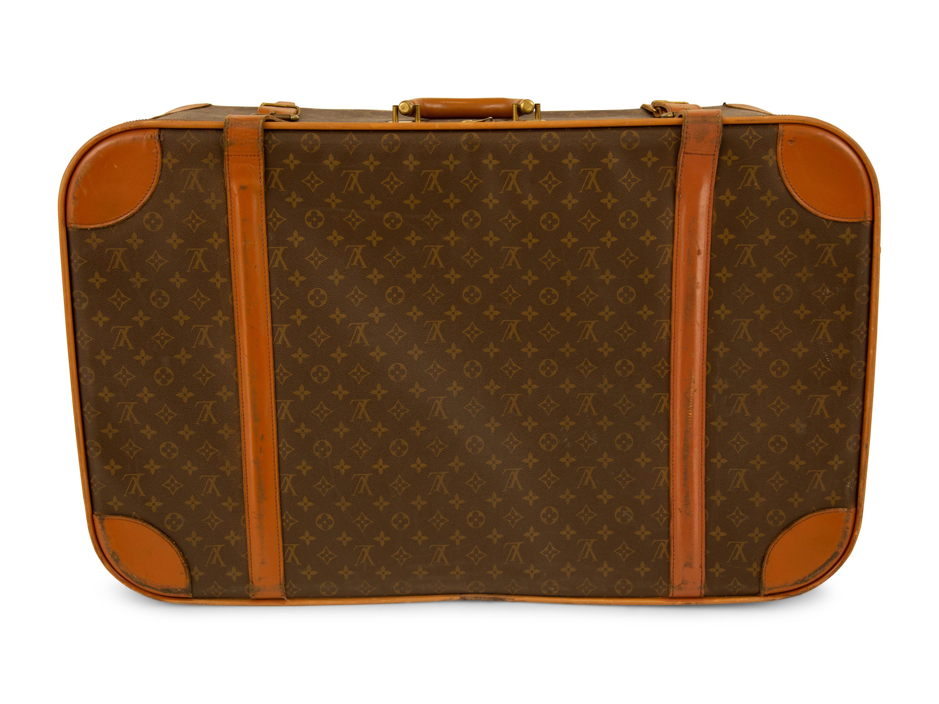 Five Louis Vuitton Luggage Pieces