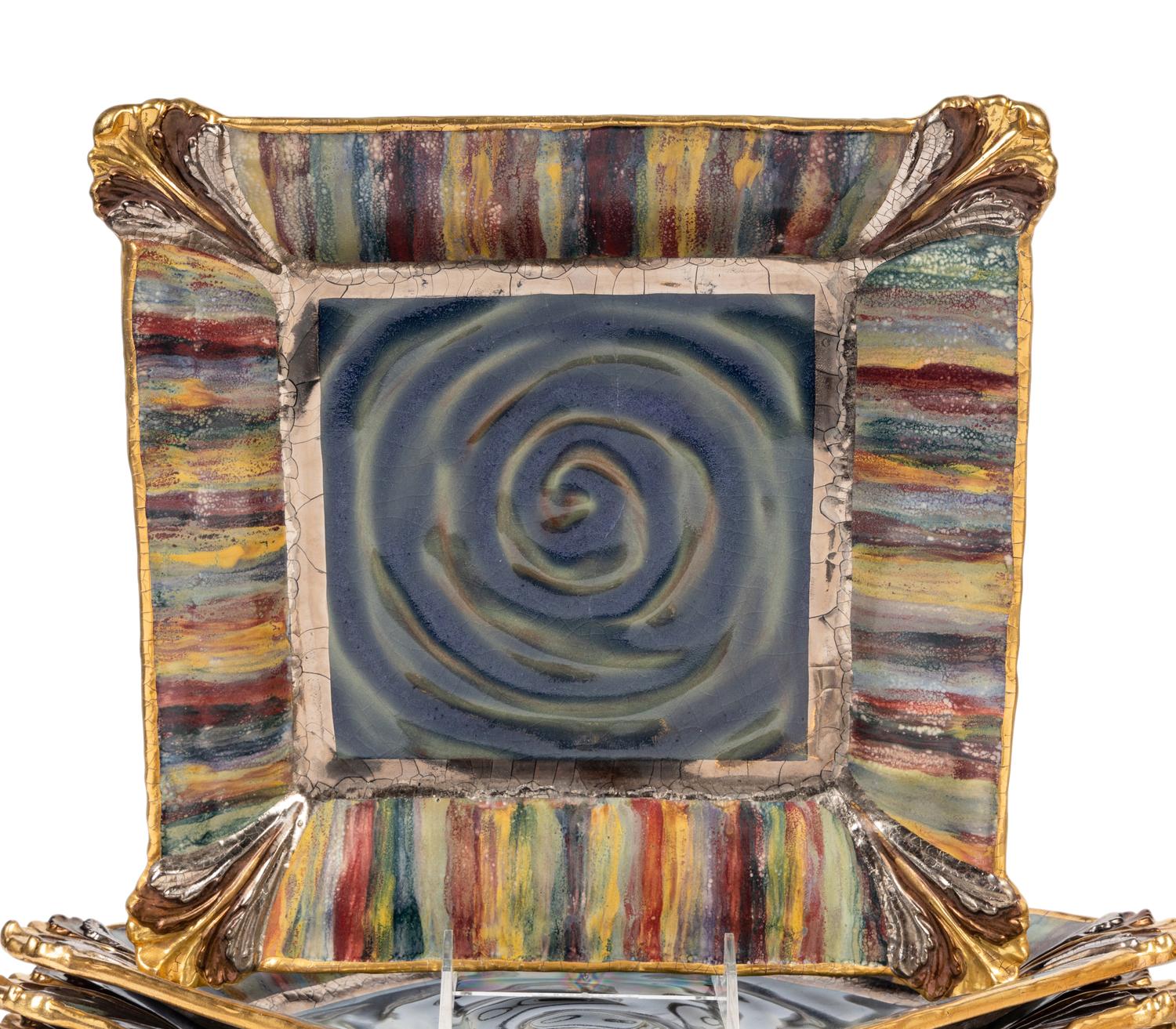 A Set of Twelve MacKenzie-Childs Ceramic Dinner Plates