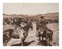 [WESTERN AMERICANA]. BELDEN, Charles J. (1888-1963), photographer. Silver gelatin photograph of cowboys sharing a pack of Camel "Tailor Made" cigarettes. Pitchfork Ranch, WY, ca 1920s-1930s.