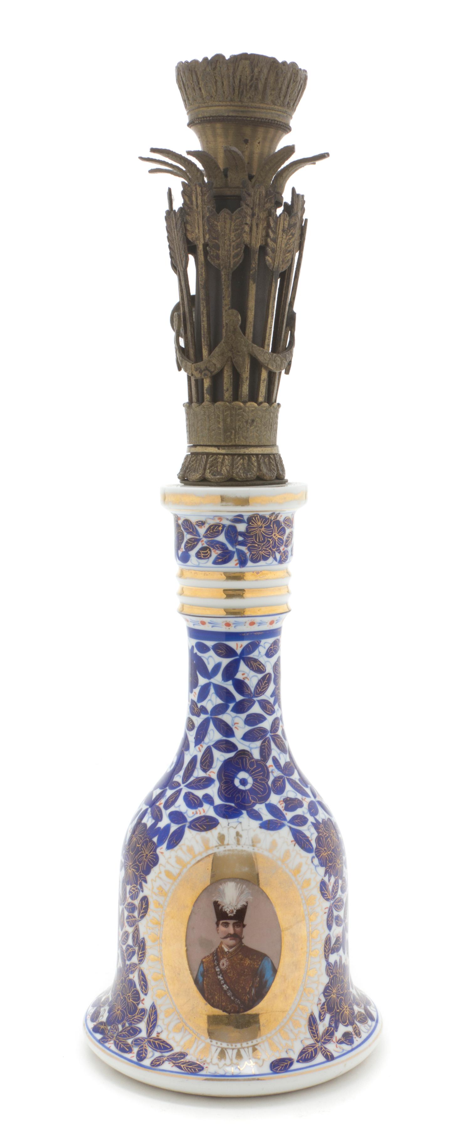 A Qajar Metal Mounted Porcelain Huqqa, Height overall 16 1/2 inches.