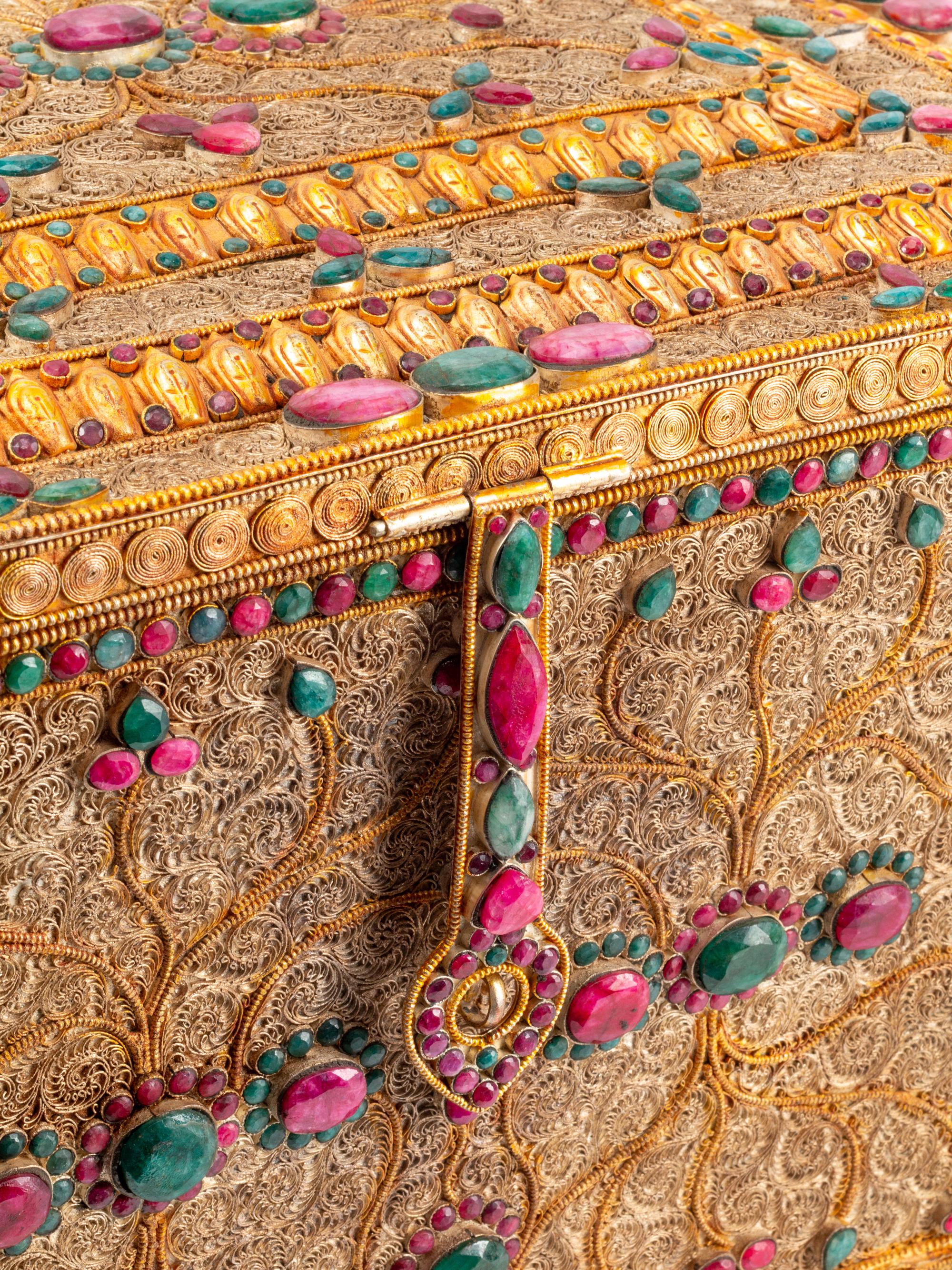 A Ruby and Emerald-Mounted Silvered and Gilt Filigree Table Casket