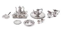 A Collection of Miniature Silver Table Articles, Various Makers, comprising two trays, two teapots, two water pitchers, a covered sugar