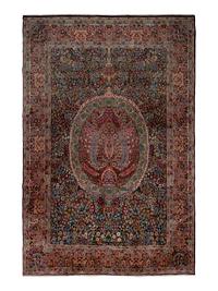 A Kirman Wool Rug