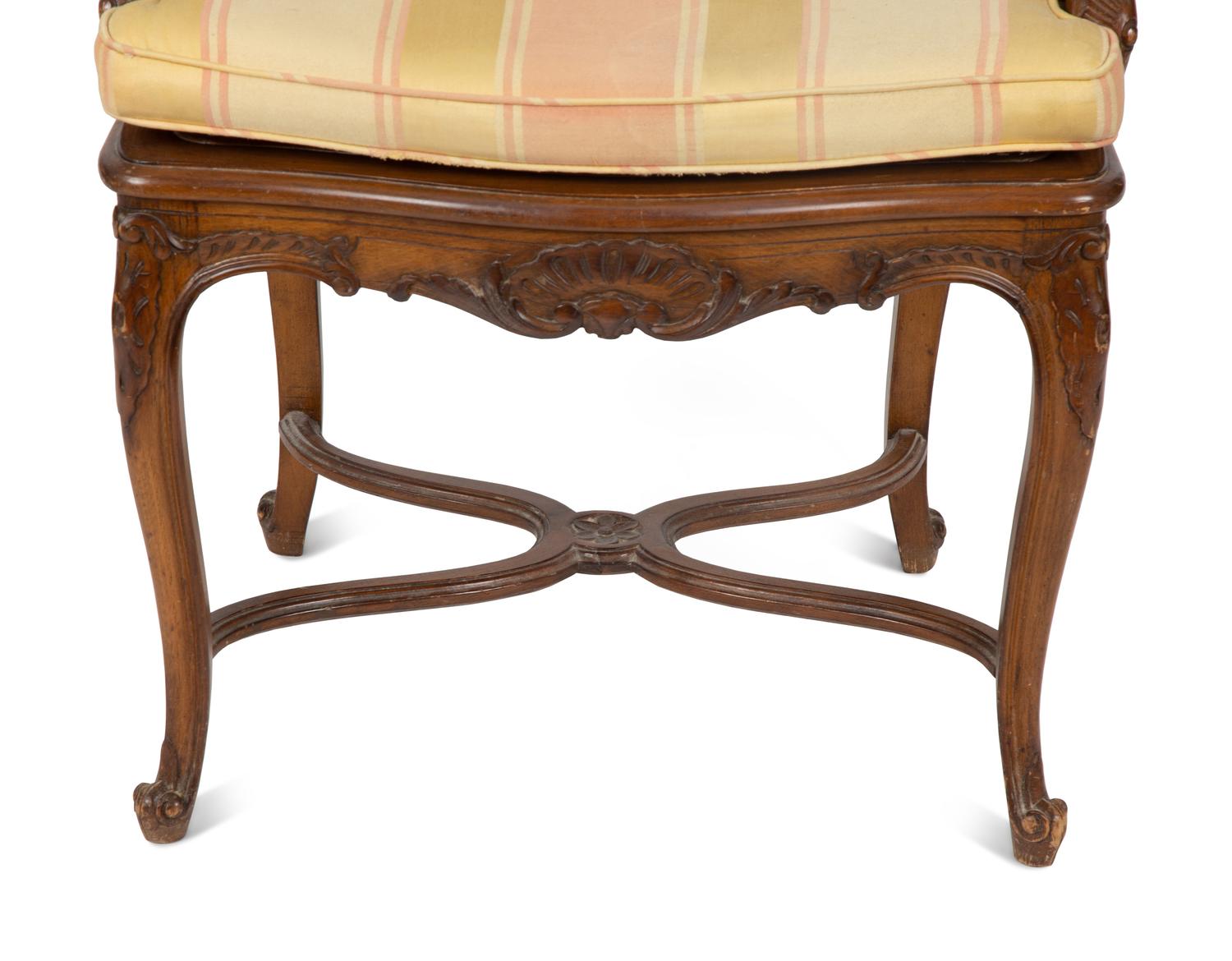 A Louis XV Style Carved Mahogany Cane Seat and Back Fauteuil — 20TH CENTURY