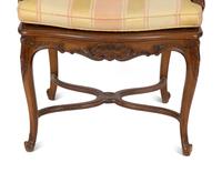 A Louis XV Style Carved Mahogany Cane Seat and Back Fauteuil — 20TH CENTURY
